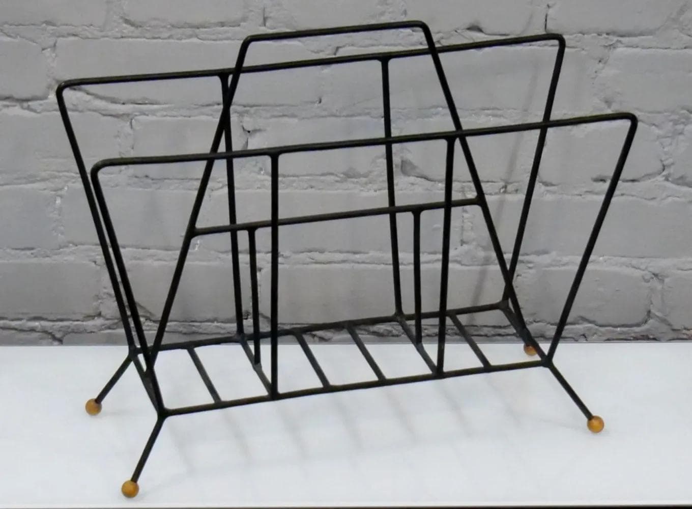 Magazine rack, black metal, by T. Paul, USA, 1950s. - 18827