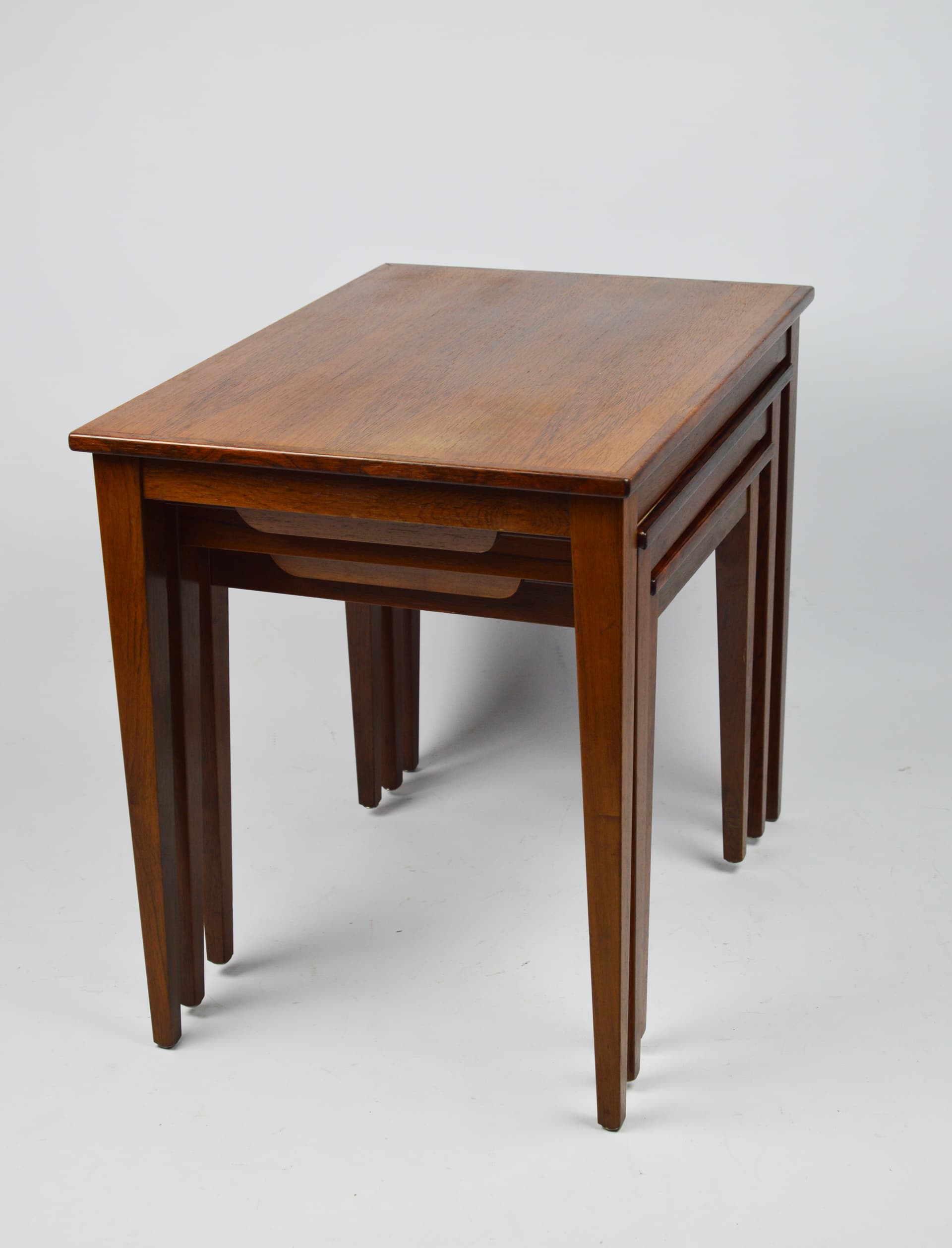 Set of three side tables, brown wood, 1970s. - 261653