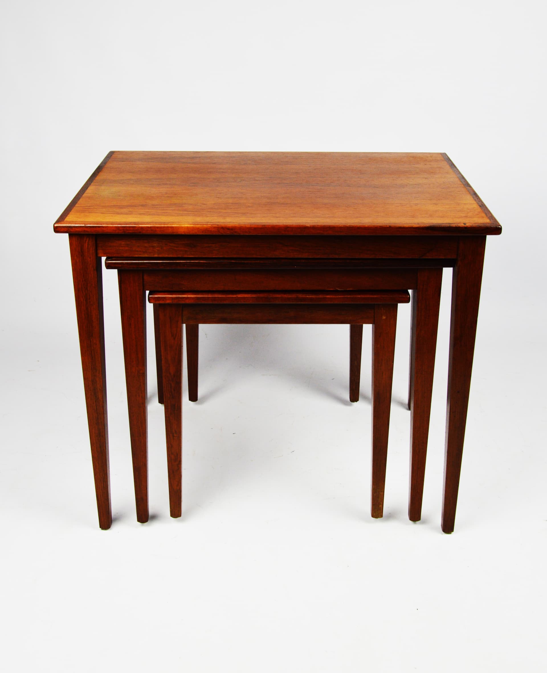 Set of three side tables, brown wood, 1970s. - 261656