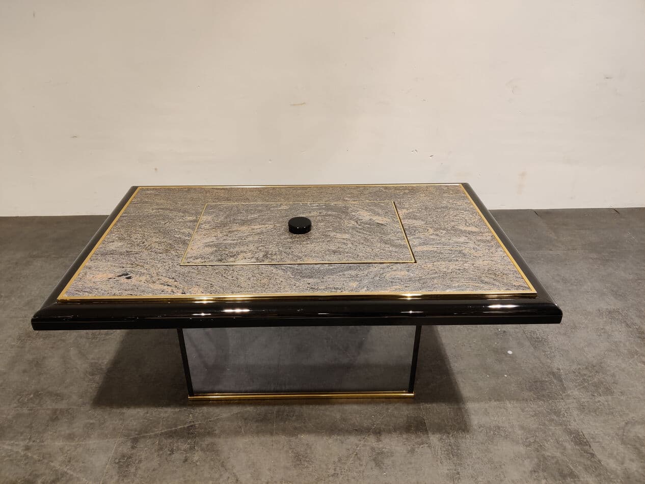 Coffee table with hidden bar, grey granite, black lacquered wood, brass, glass, Belgium, 1980s. - 274673