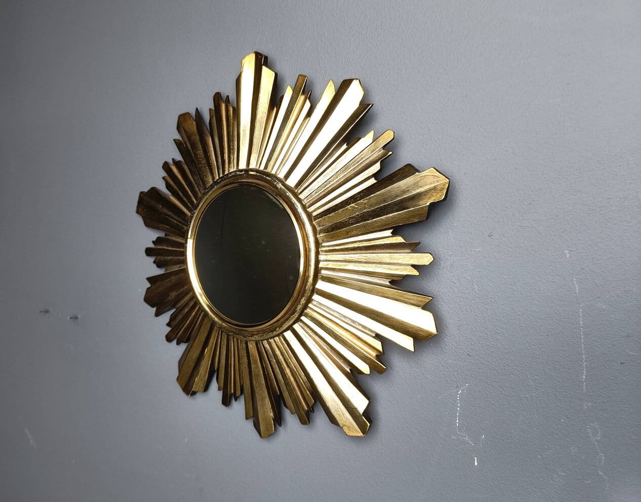 Sunburst mirror, gold, glass, Belgium, 1960s. - 272564