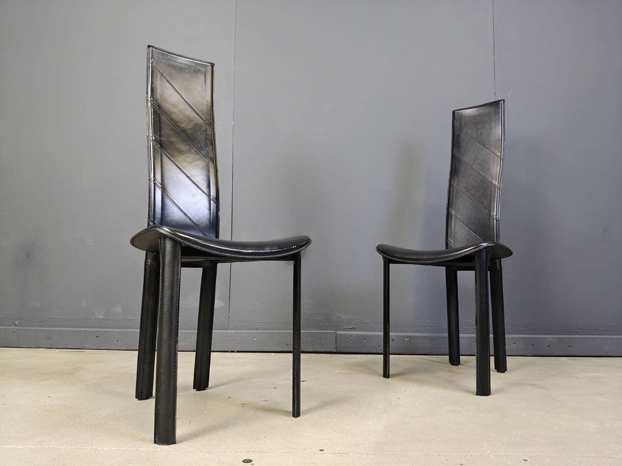 Set of six dining chairs, black leather, Italy, 1980s. - 272337