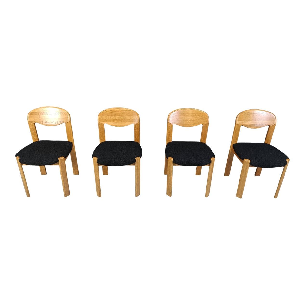 Set of four chairs, brown oak, black bouclé, Denmark, 1970s.
