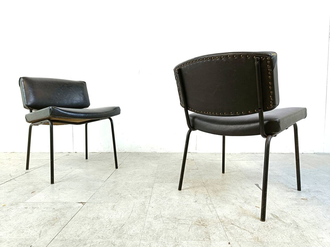 Pair of chairs Conseil, black, black leatherette, black metal, by P. Guariche, Meurop, France, 1950s - 271097