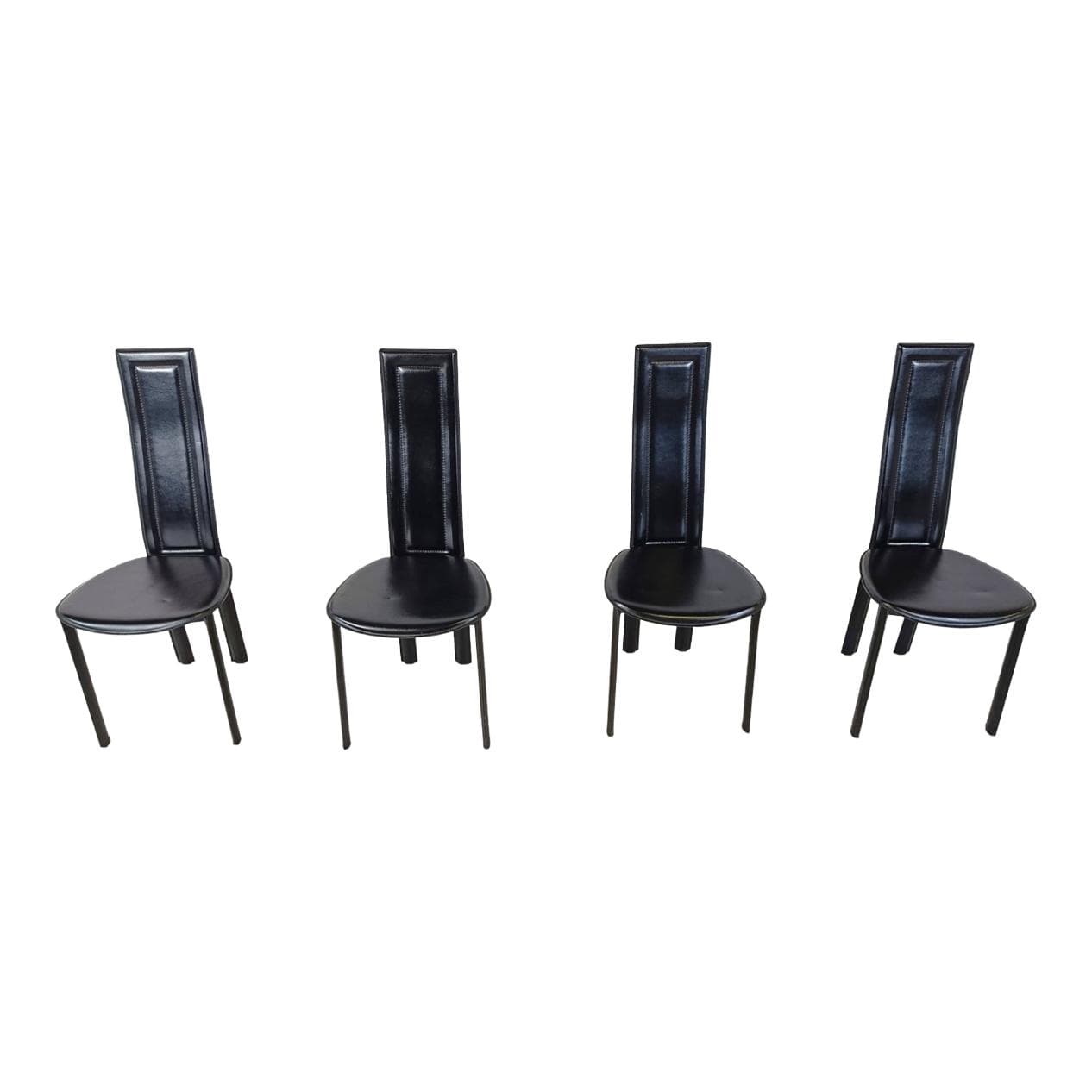 Set of four chairs, black leather, Italy, 1980s.
