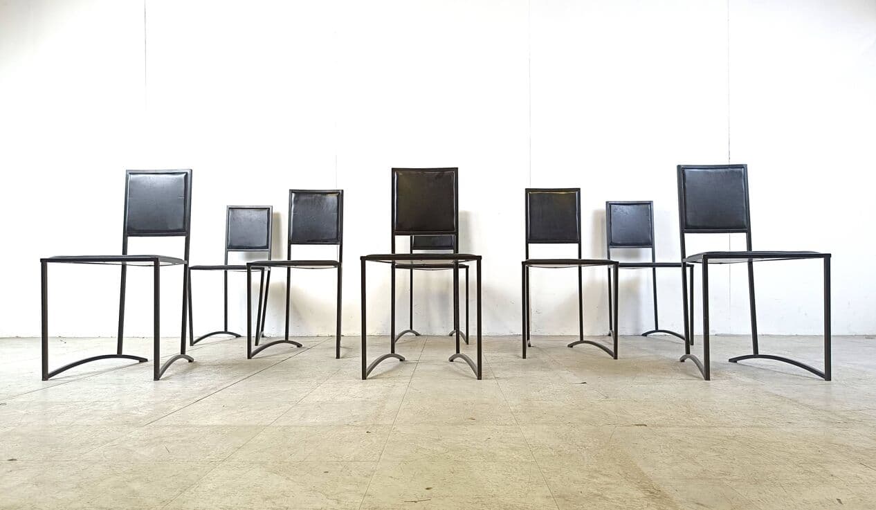 Set of eight postmodern dining chairs, black synthetic leather, black steel, Italy, 1980s. - 270406