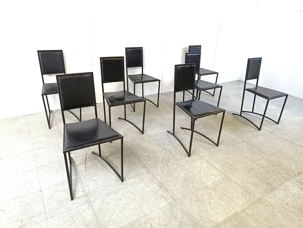 Set of eight postmodern dining chairs, black synthetic leather, black steel, Italy, 1980s. - 270408