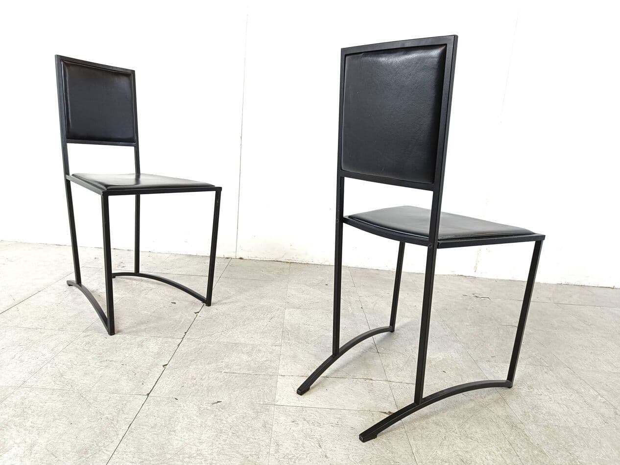 Set of eight postmodern dining chairs, black synthetic leather, black steel, Italy, 1980s. - 270409