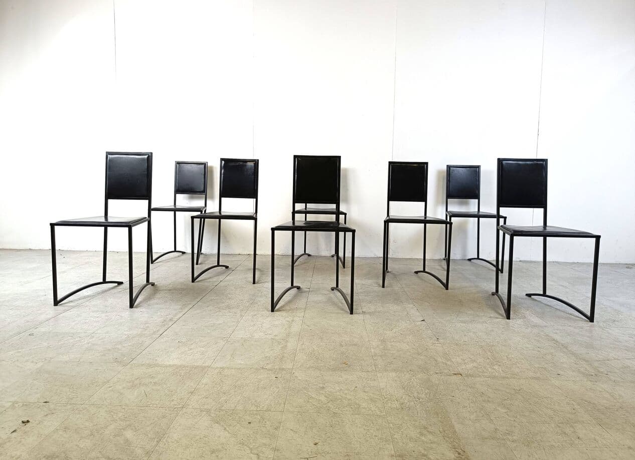 Set of eight postmodern dining chairs, black synthetic leather, black steel, Italy, 1980s. - 270405