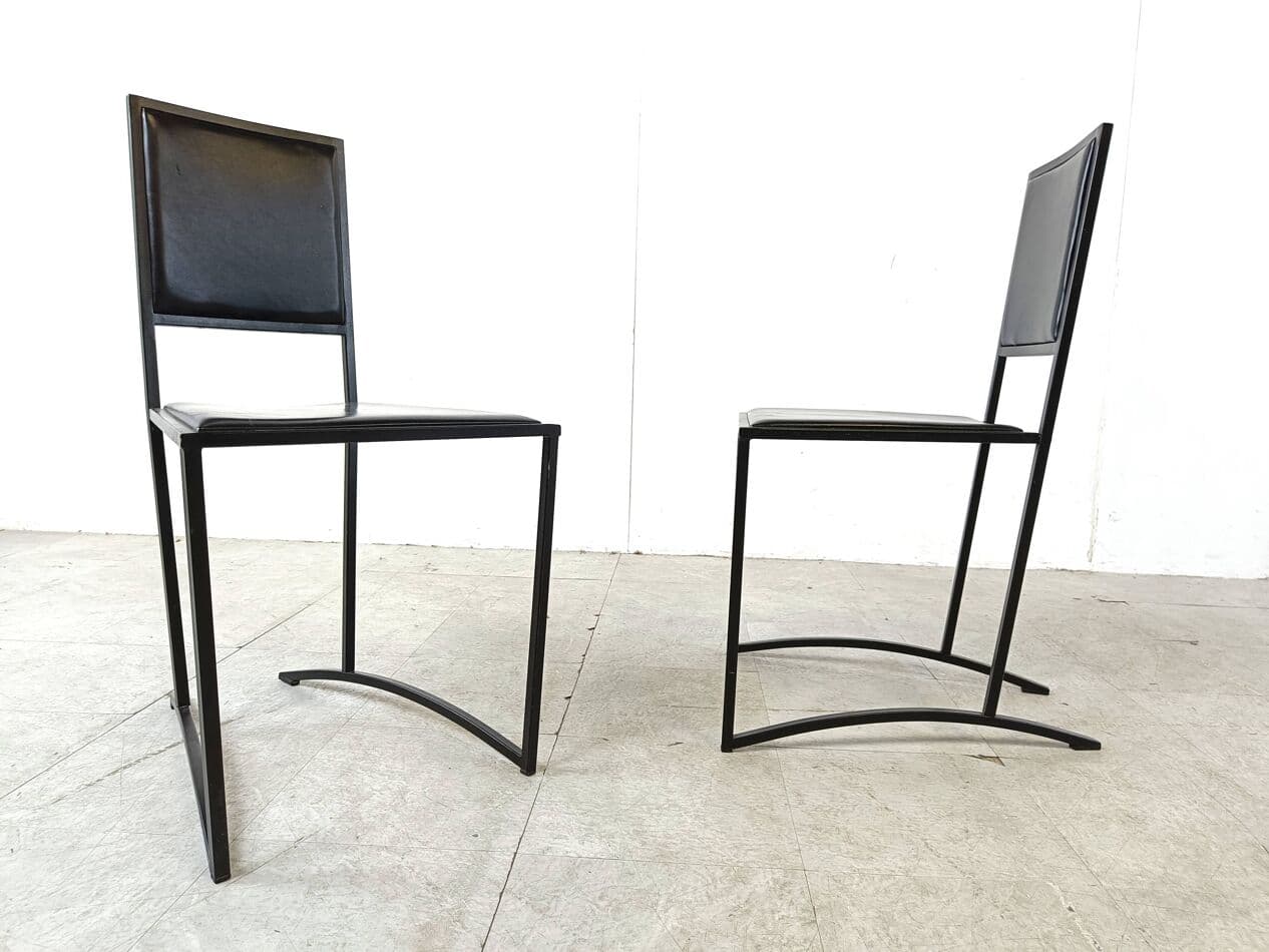 Set of eight postmodern dining chairs, black synthetic leather, black steel, Italy, 1980s. - 270410