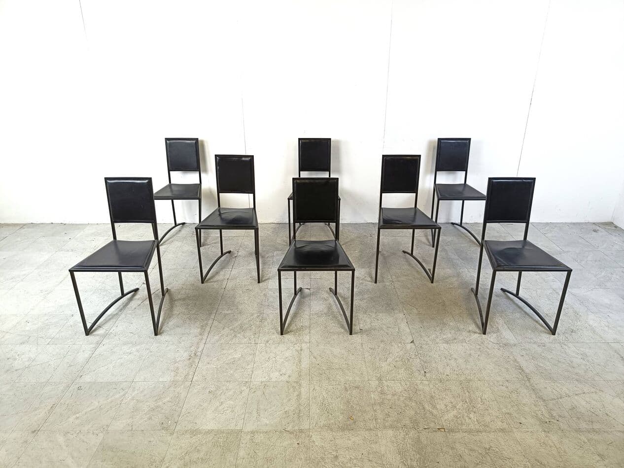 Set of eight postmodern dining chairs, black synthetic leather, black steel, Italy, 1980s. - 270411