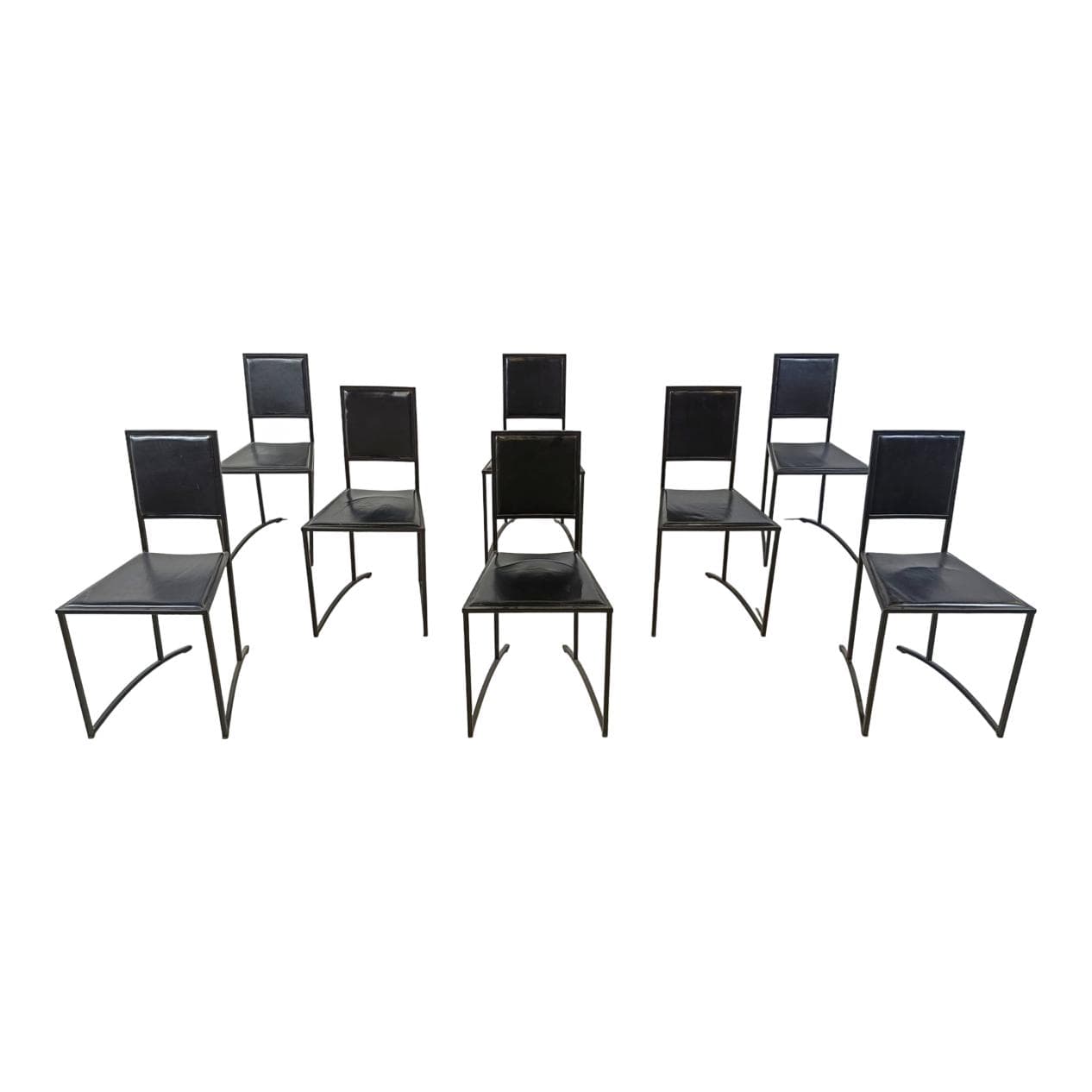 Set of eight postmodern dining chairs, black synthetic leather, black steel, Italy, 1980s.