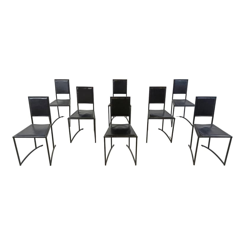Set of eight postmodern dining chairs, black synthetic leather, black steel, Italy, 1980s.