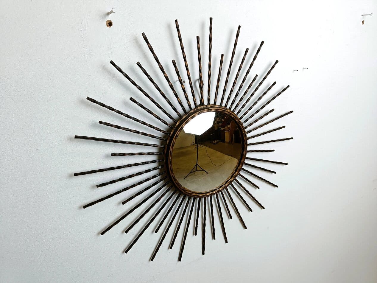 Sunburst mirror, gold metal, glass, France, 1970s. - 269577