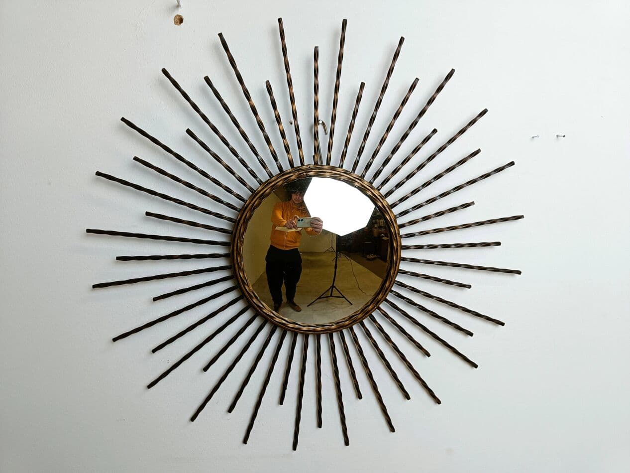 Sunburst mirror, gold metal, glass, France, 1970s. - 269582