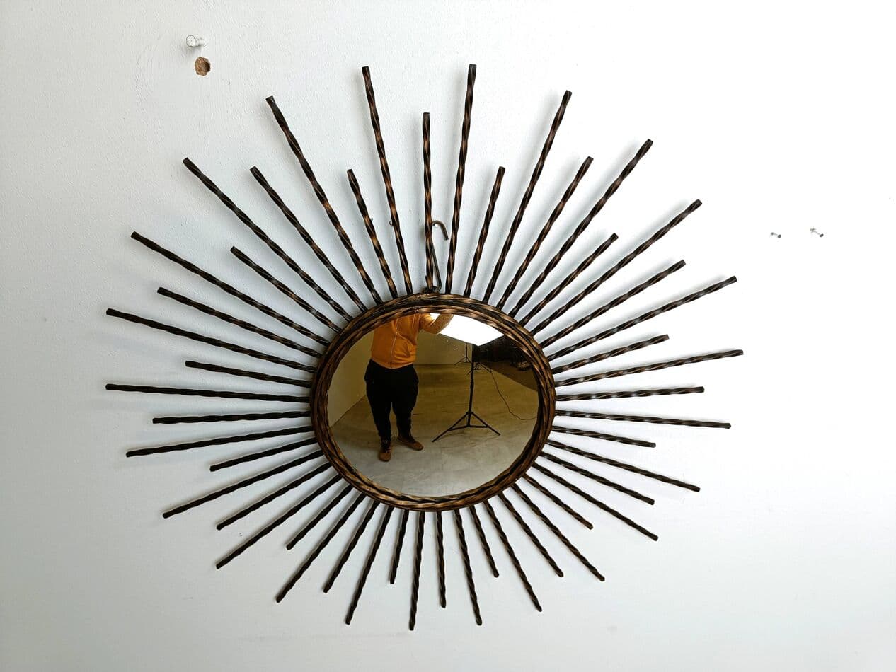 Sunburst mirror, gold metal, glass, France, 1970s. - 269581