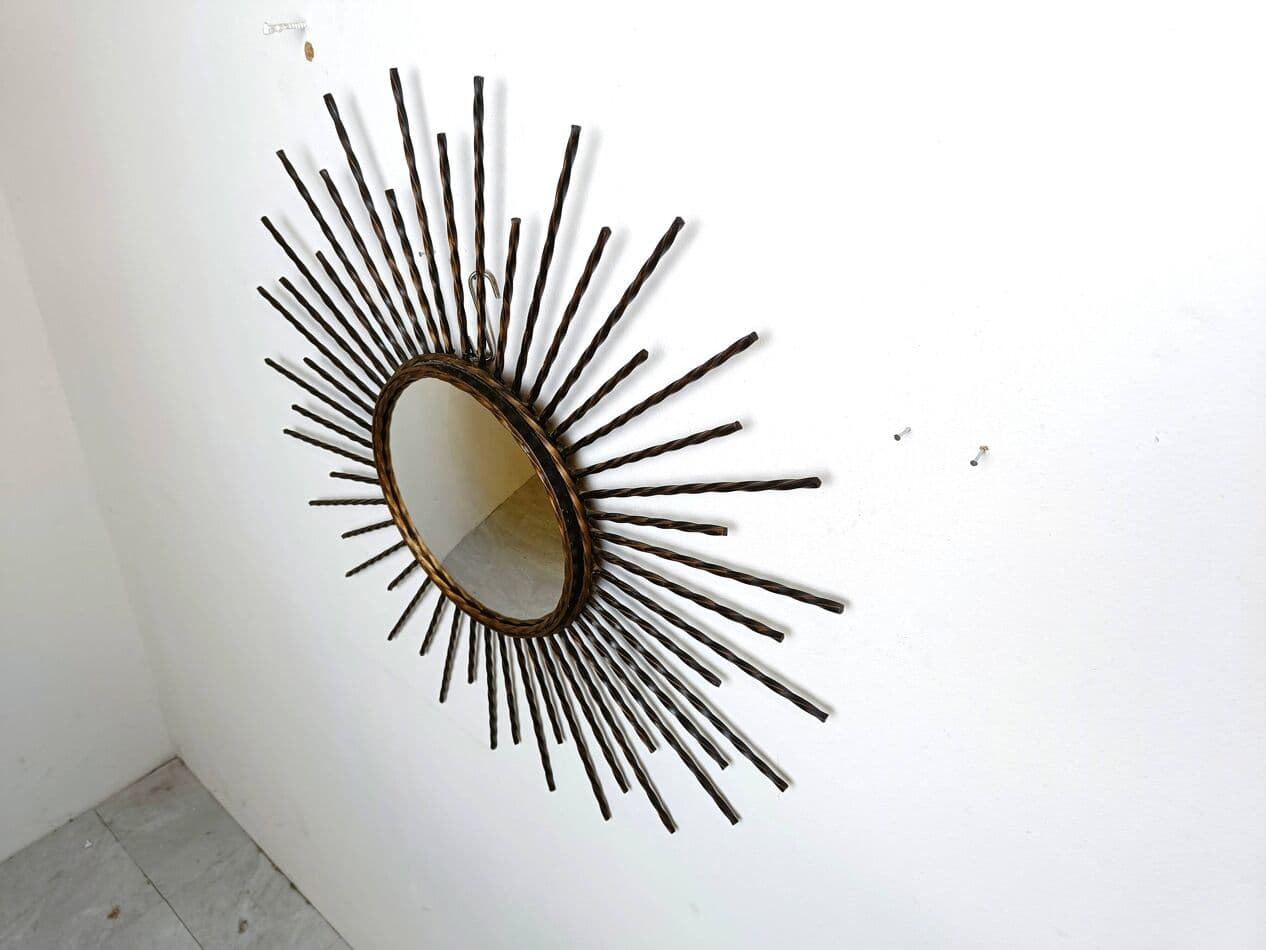 Sunburst mirror, gold metal, glass, France, 1970s. - 269584