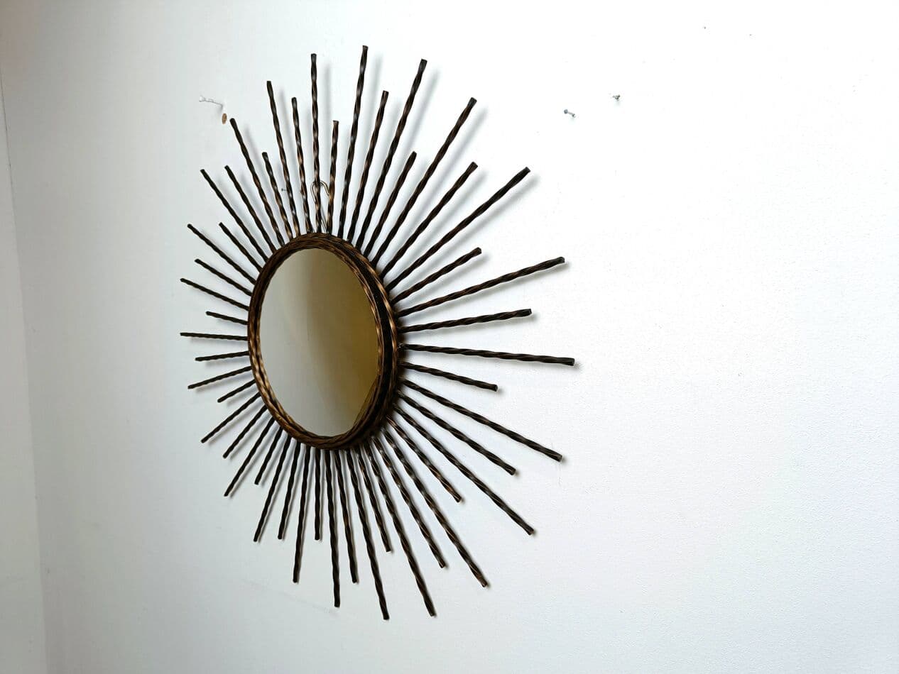 Sunburst mirror, gold metal, glass, France, 1970s. - 269586