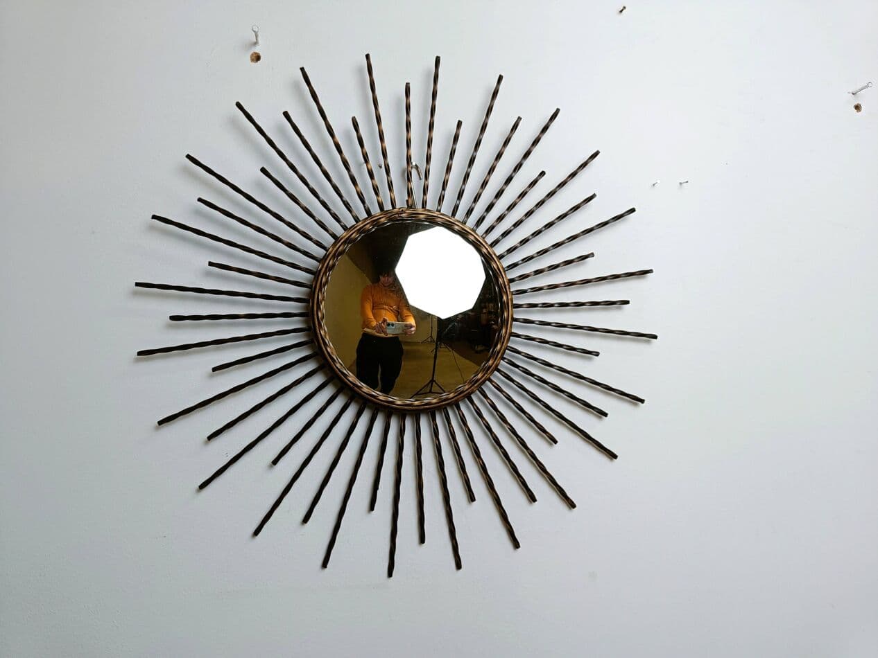 Sunburst mirror, gold metal, glass, France, 1970s. - 269583