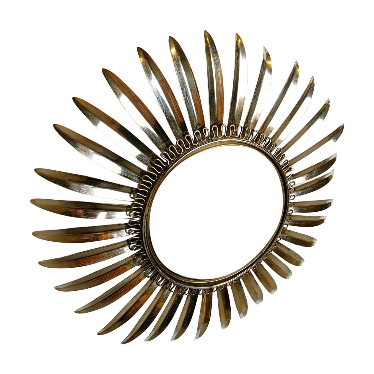 Sunburst mirror, gold brass, France, 1970s.