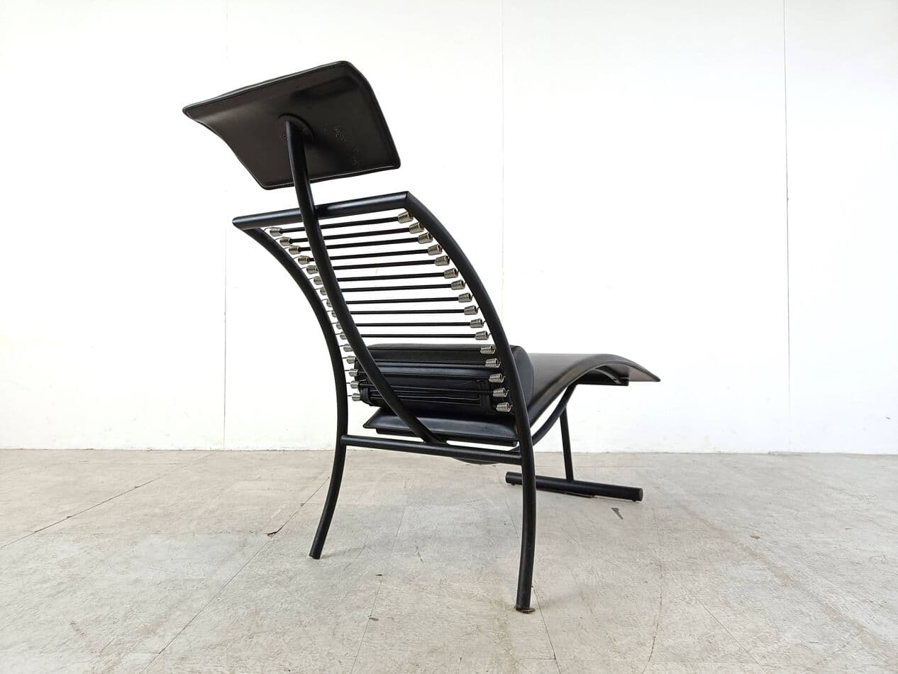 Chaise longue, black leather, black metal, Italy, 1990s. - 268787