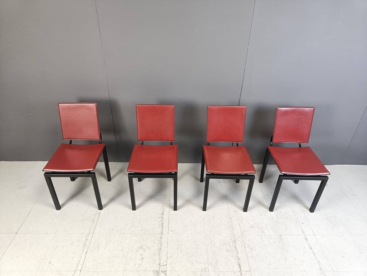 Set of four postmodern chairs, bordeaux leather, black steel, Italy, 1980s. - 264132