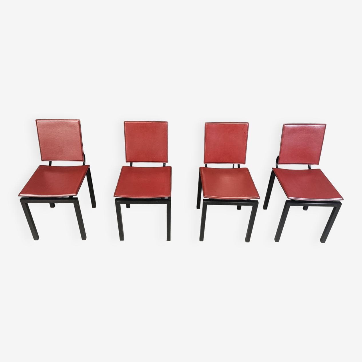 Set of four postmodern chairs, bordeaux leather, black steel, Italy, 1980s. - 264131