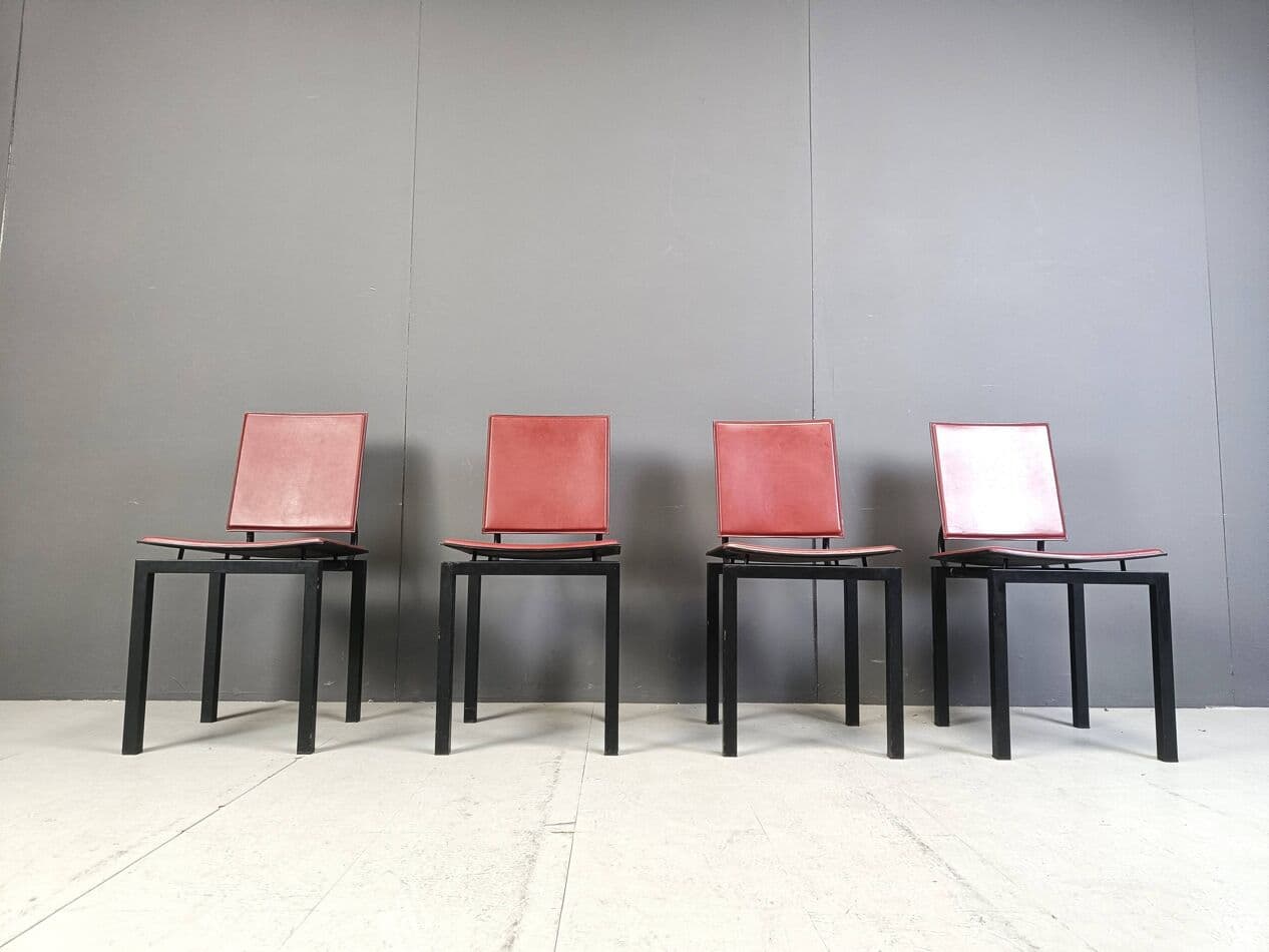 Set of four postmodern chairs, bordeaux leather, black steel, Italy, 1980s. - 264135