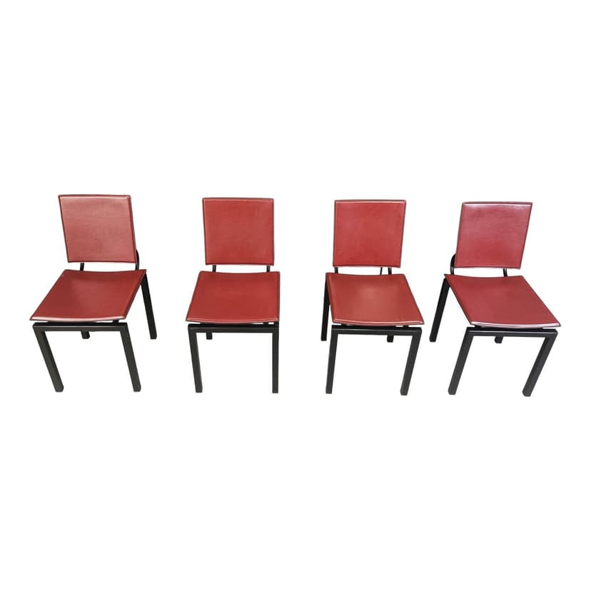 Set of four postmodern chairs, bordeaux leather, black steel, Italy, 1980s.