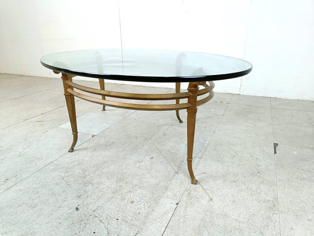 Coffee table oval, gold metal, glass, Spain, 1970s. - 263692