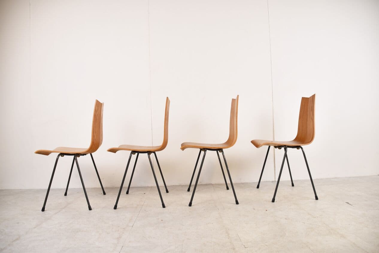 Set of Four Chairs Model GA, brown plywood, black steel, by H. Bellmann, Switzerland, 1960s. - 263047