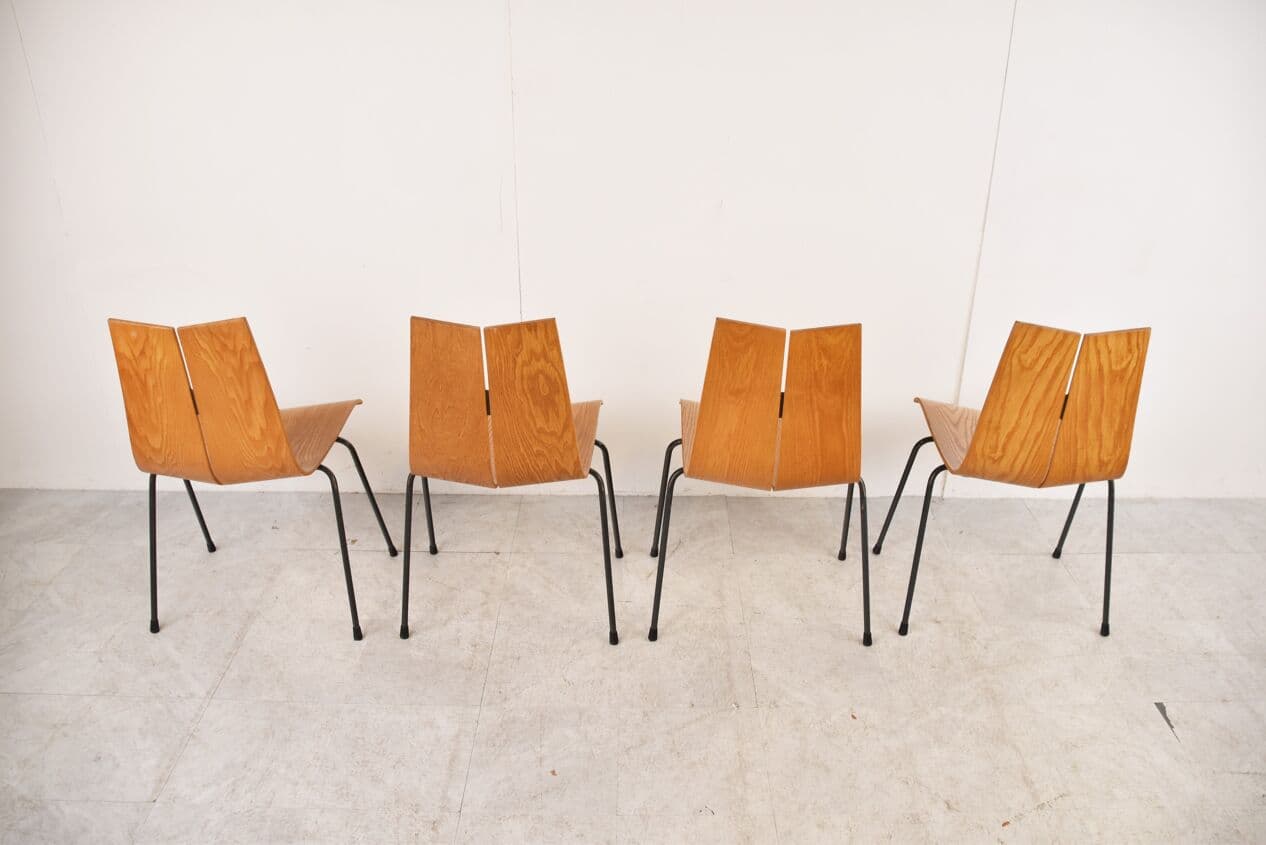 Set of Four Chairs Model GA, brown plywood, black steel, by H. Bellmann, Switzerland, 1960s. - 263048
