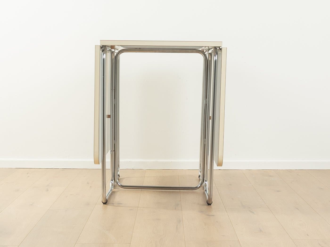 Folding table, white laminate, chromed steel, by C. Taube, Germany, 1970s. - 283174