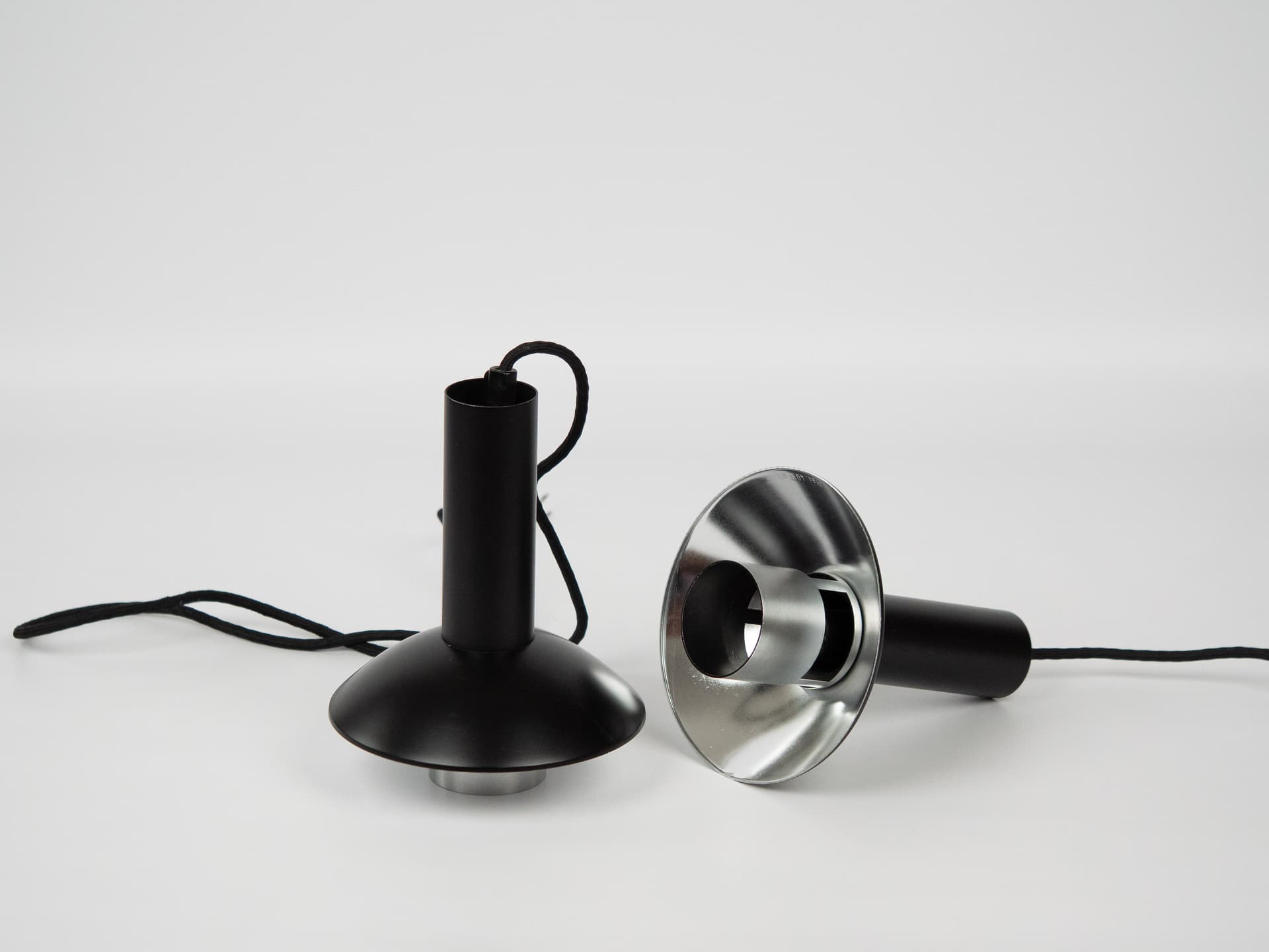 Pair of pendant lamps Louise, black metal, silver aluminum, Louis Poulsen, Denmark, 1970s. - 291429