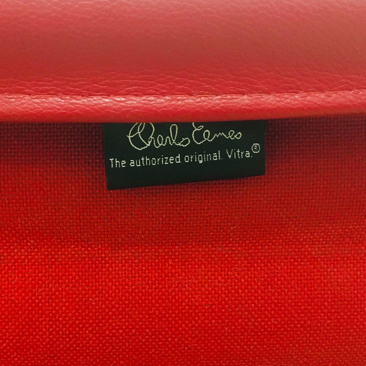 Lounge Chair EA116, red leather, silver aluminium, by C. & R. Eames, Vitra, Poland, 1990s. - 294648