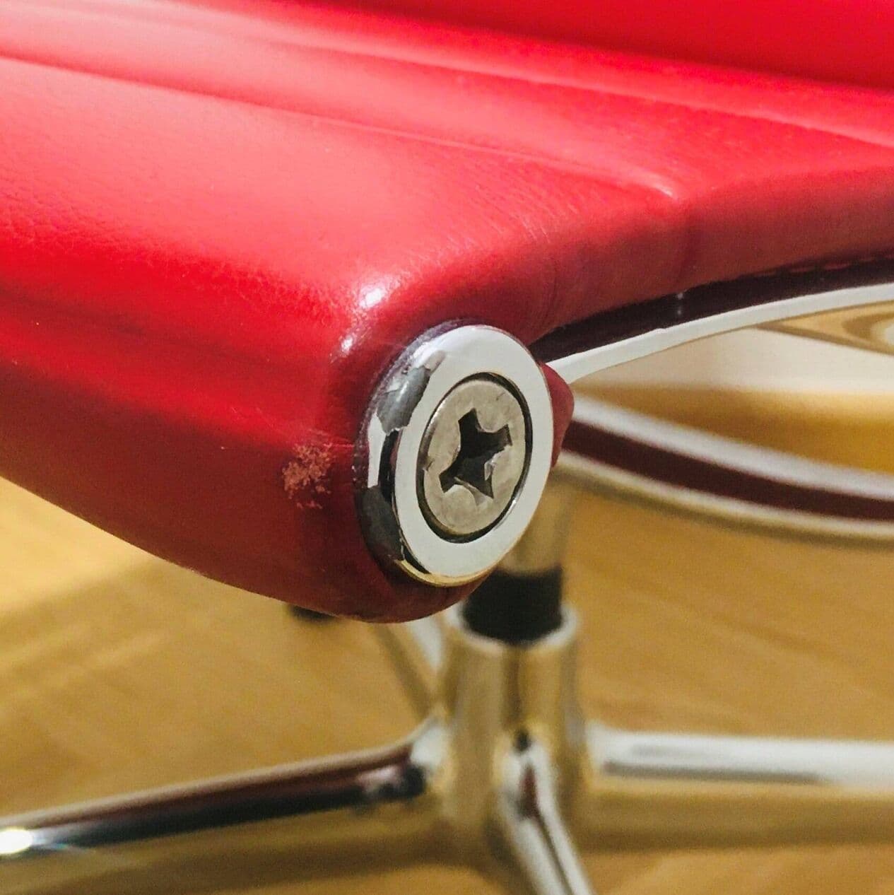 Lounge Chair EA116, red leather, silver aluminium, by C. & R. Eames, Vitra, Poland, 1990s. - 294650