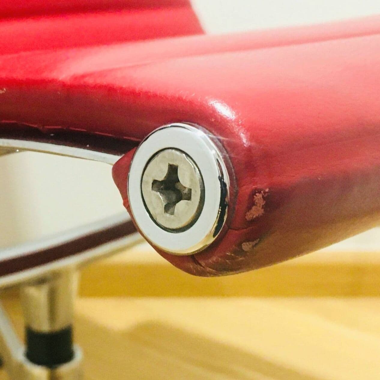 Lounge Chair EA116, red leather, silver aluminium, by C. & R. Eames, Vitra, Poland, 1990s. - 294649
