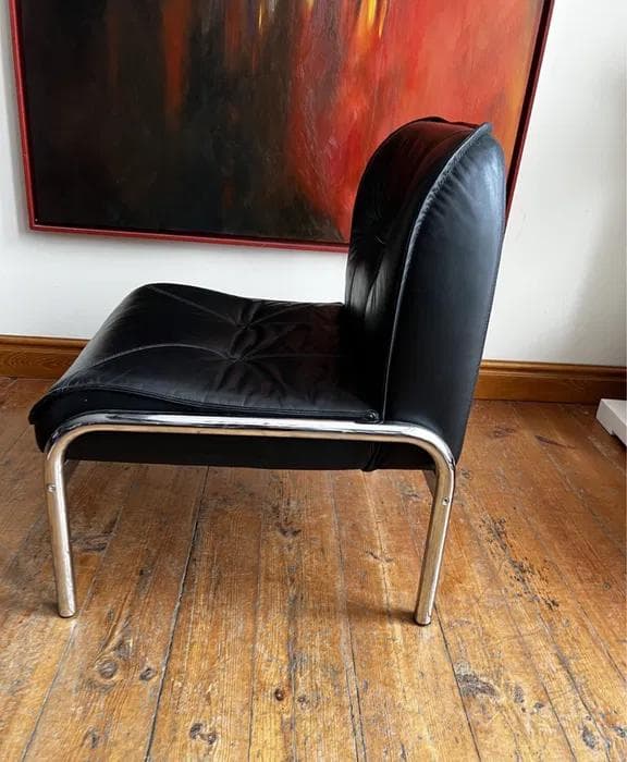 Armchair Eurochair, black leather, chrome steel, by H. Eichenberger, Switzerland, 1980s. - 298608