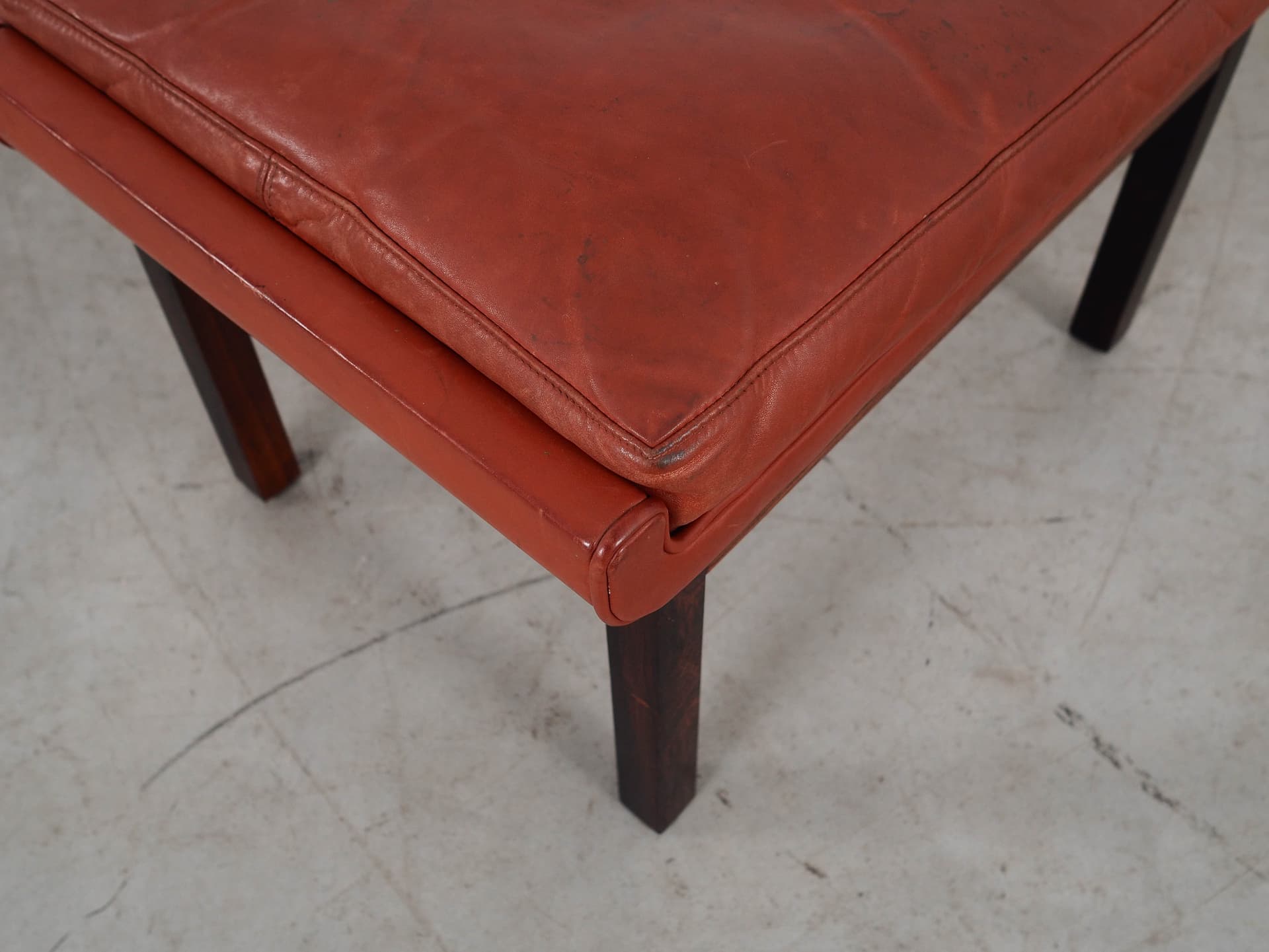 Ottoman, brick red leather, rosewood, by F. Juhl, Denmark, 1970s. - 298788