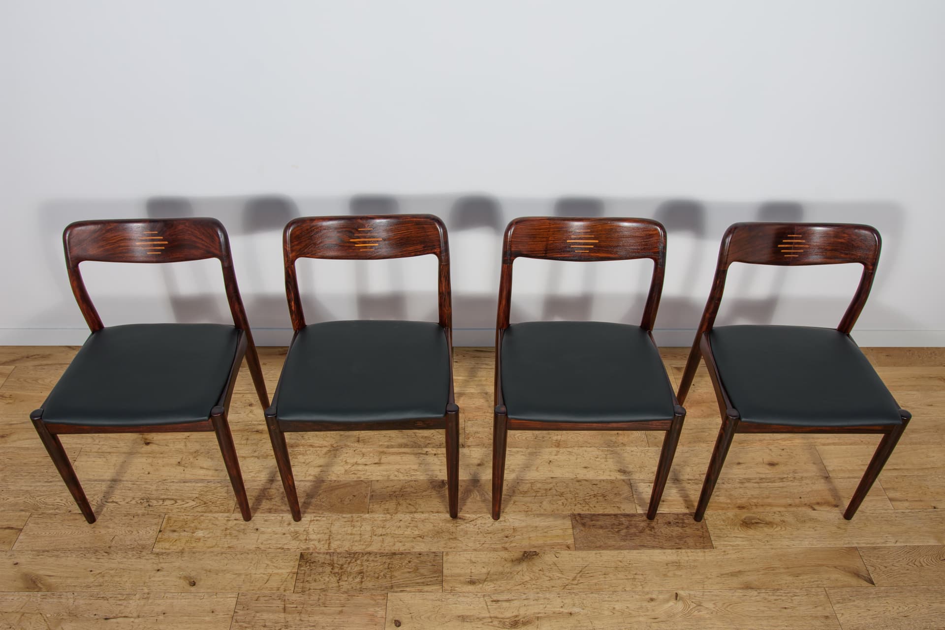Set of four chairs, brown rosewood, black genuine leather, Uldum Møbelfabrik, Denmark, 1960s. - 298797