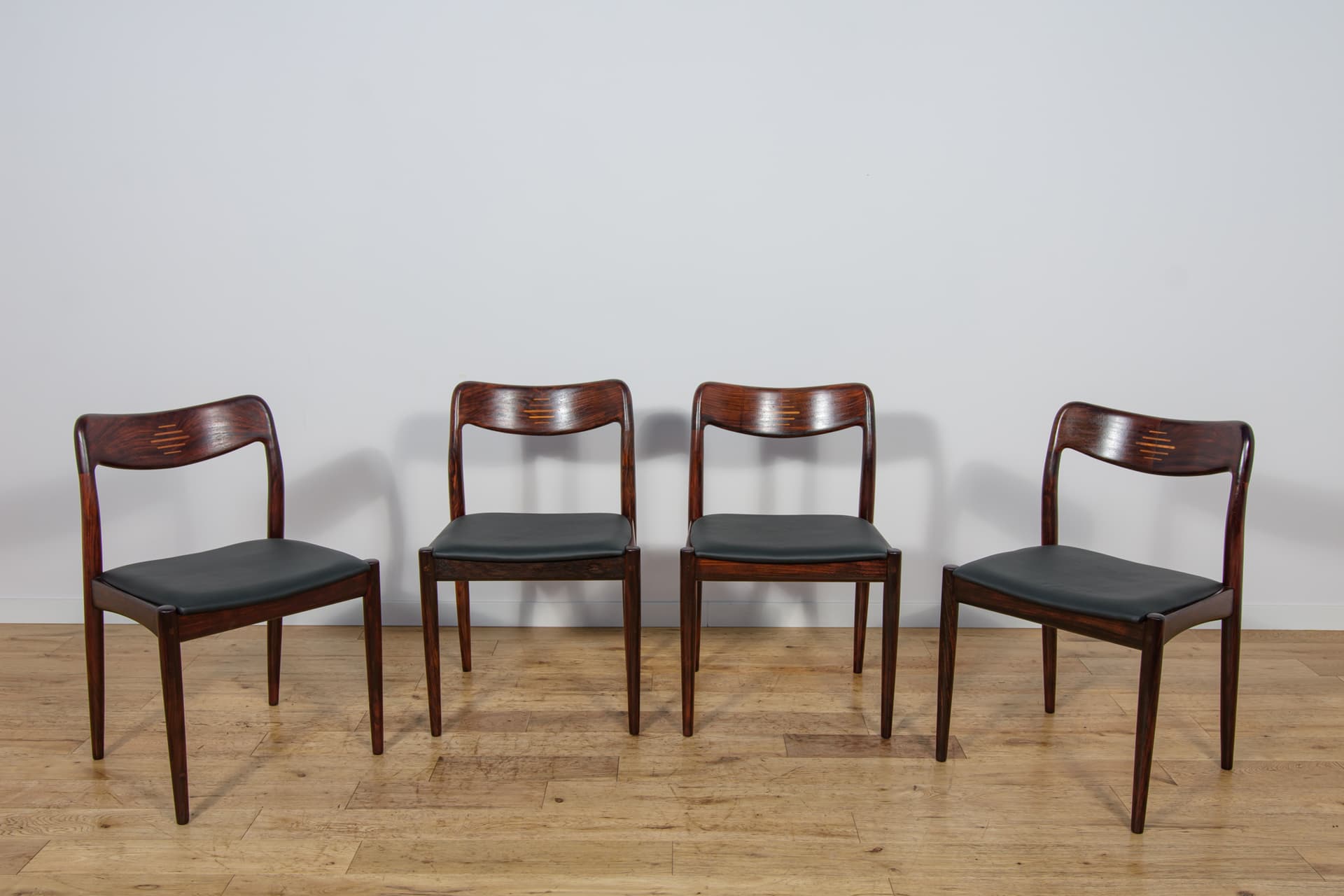 Set of four chairs, brown rosewood, black genuine leather, Uldum Møbelfabrik, Denmark, 1960s. - 298795
