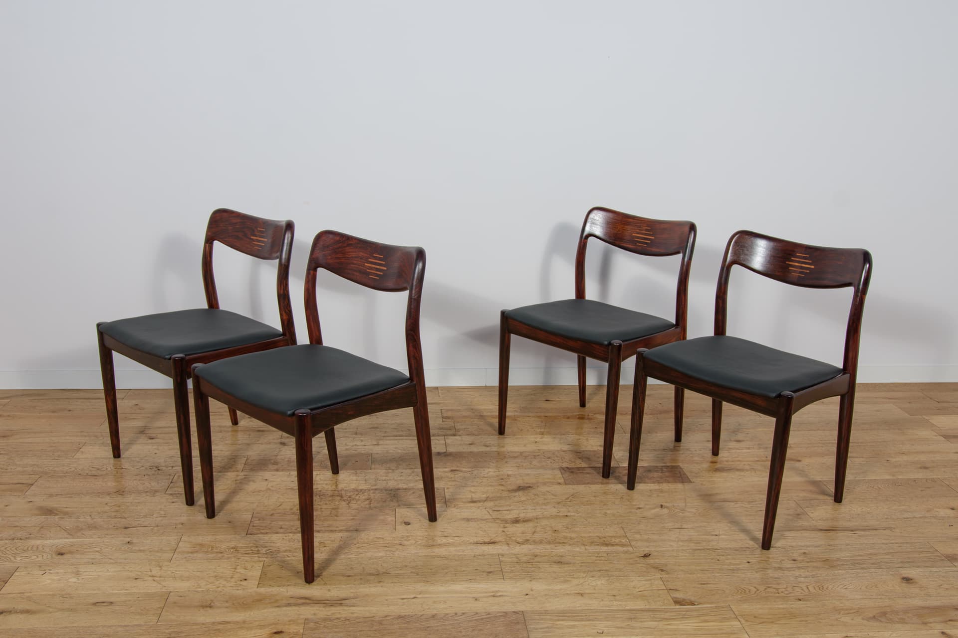 Set of four chairs, brown rosewood, black genuine leather, Uldum Møbelfabrik, Denmark, 1960s. - 298798