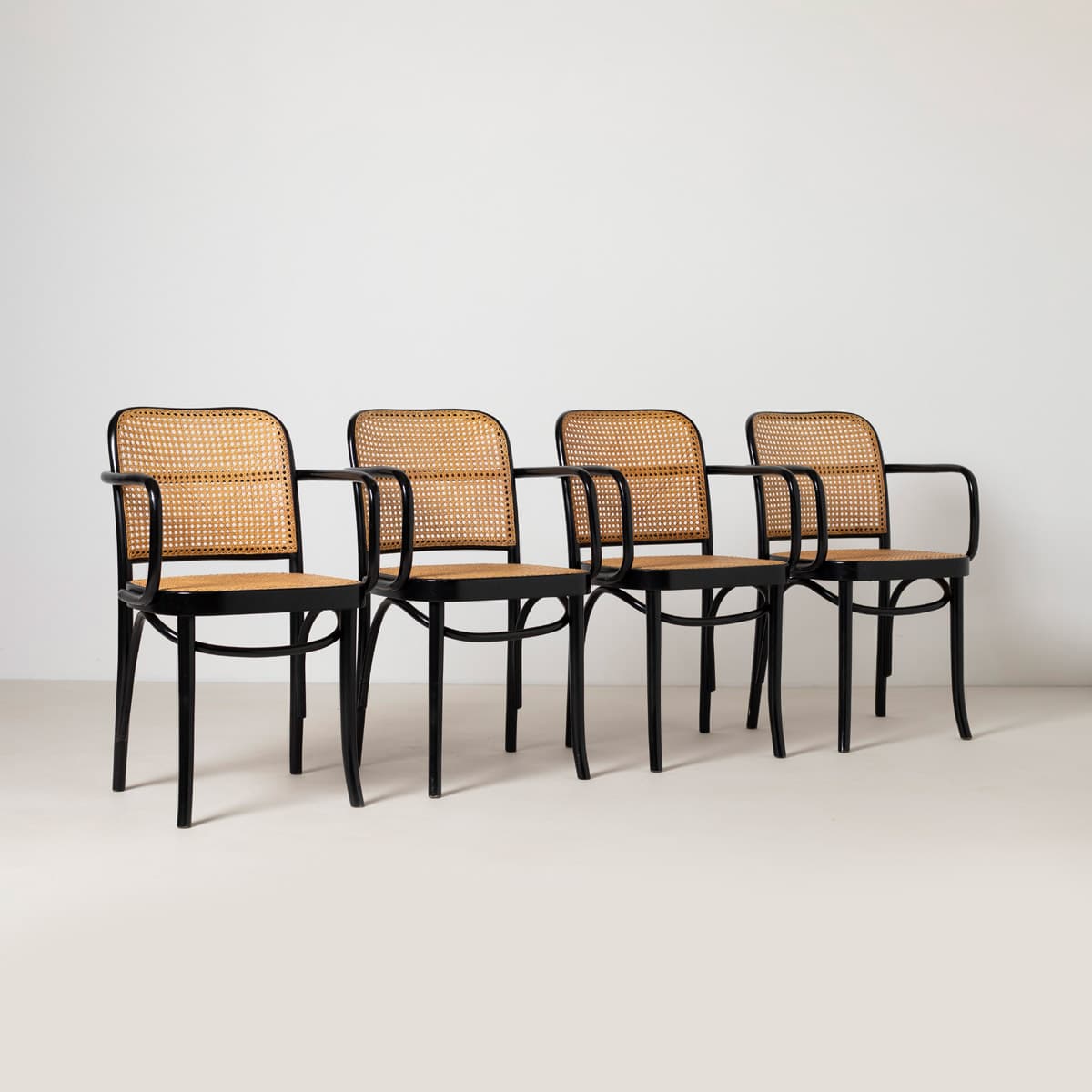 Set of Four Armchairs Prague 811, black beech, natural rattan, by J. Hoffmann, Zakład Mebli Giętych w Radomsku, Poland, 1970s. - 299452