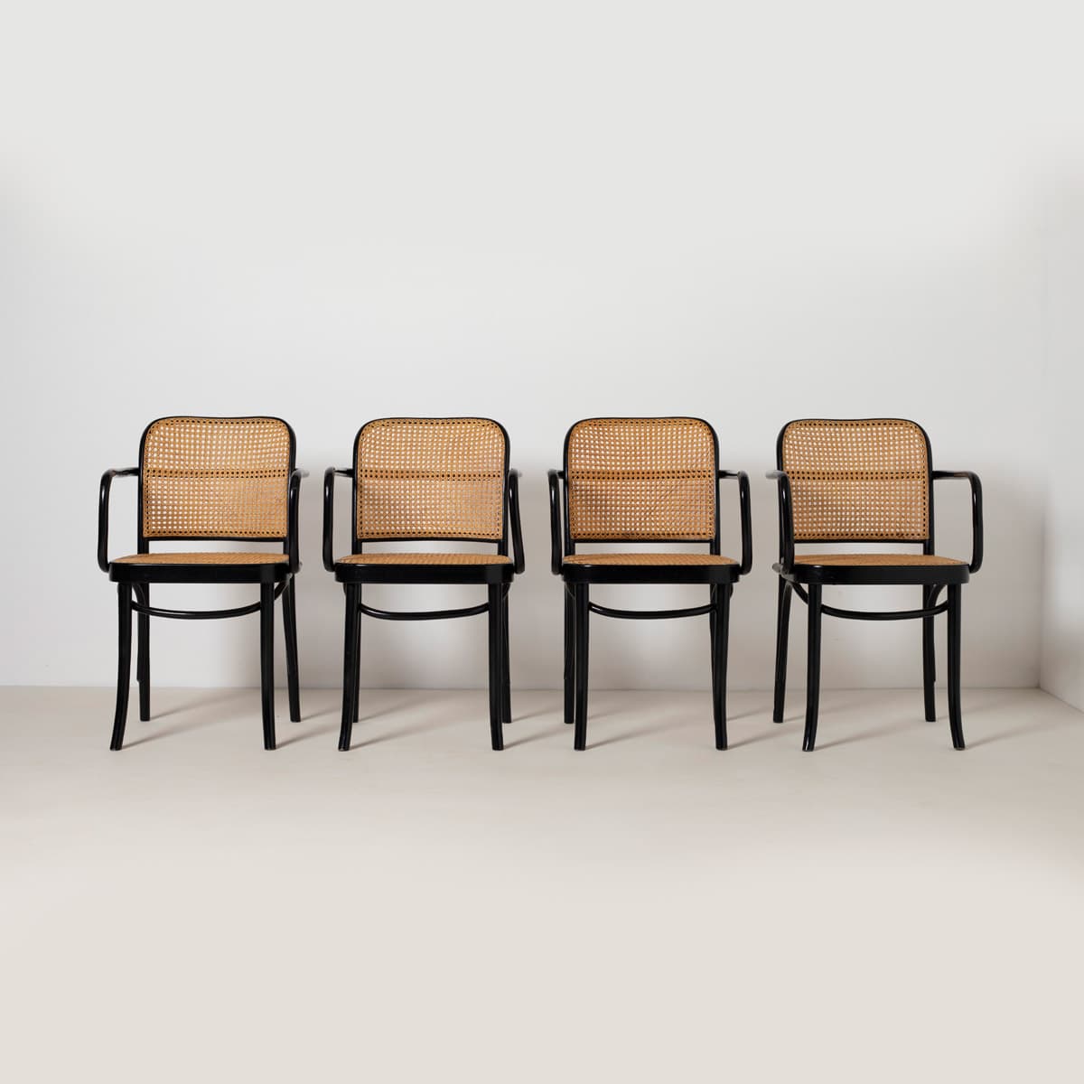 Set of Four Armchairs Prague 811, black beech, natural rattan, by J. Hoffmann, Zakład Mebli Giętych w Radomsku, Poland, 1970s. - 299453