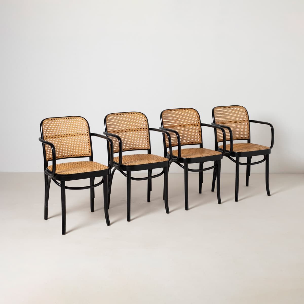 Set of Four Armchairs Prague 811, black beech, natural rattan, by J. Hoffmann, Zakład Mebli Giętych w Radomsku, Poland, 1970s. - 299451