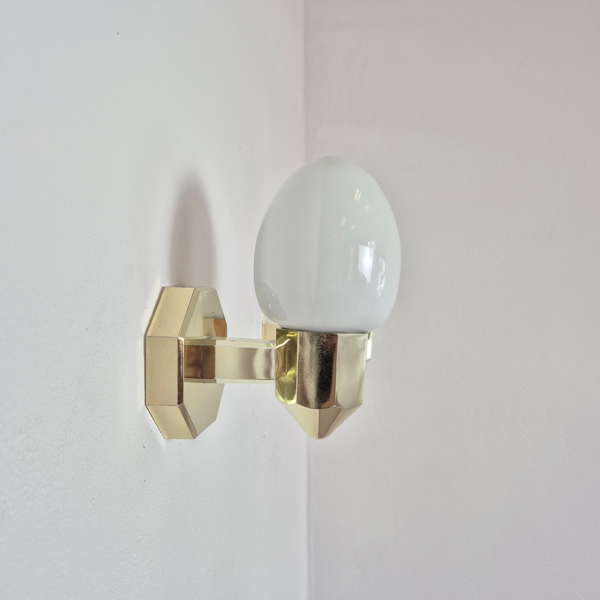 Pair of wall sconces, gold plastic, white glass, Germany, 1980s. - 300026