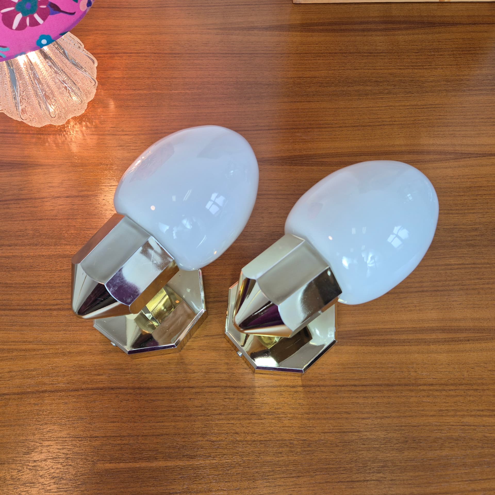 Pair of wall sconces, gold plastic, white glass, Germany, 1980s. - 300031