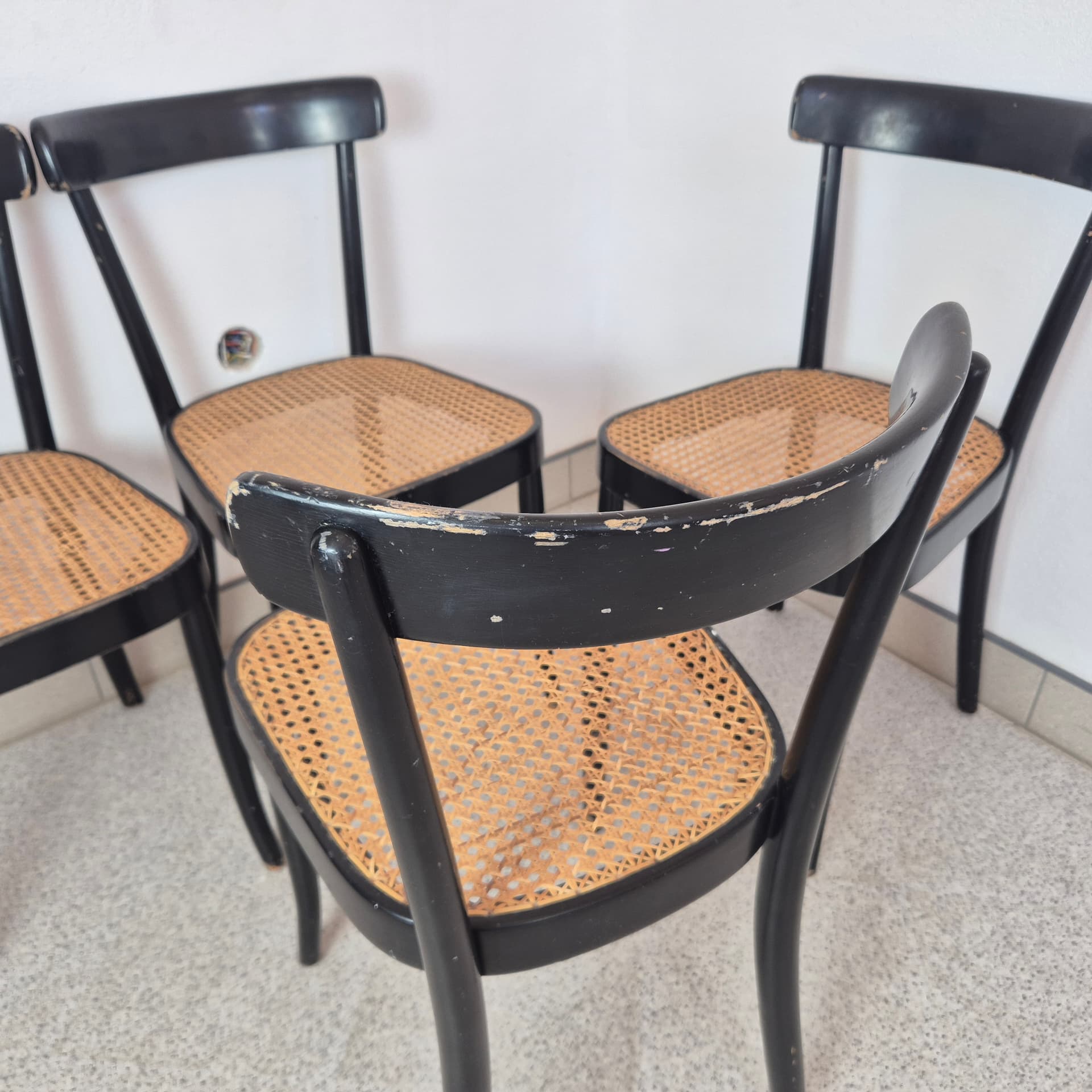 Set of chairs, black wood, brown rattan, by M. Moser, Horgenglarus, Switzerland, 1940s. - 300071