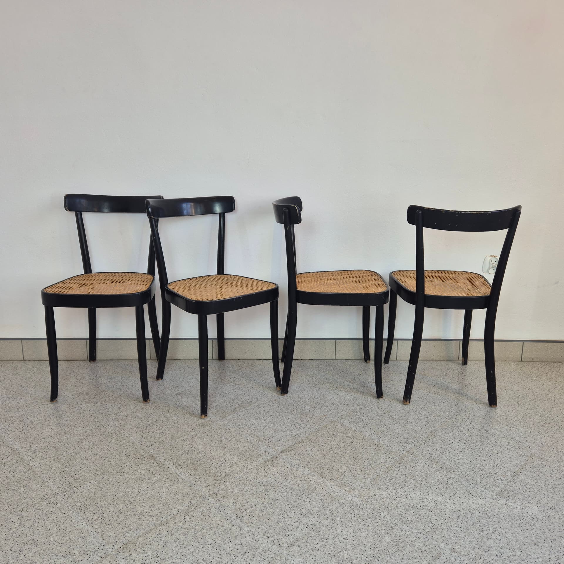 Set of chairs, black wood, brown rattan, by M. Moser, Horgenglarus, Switzerland, 1940s. - 300070