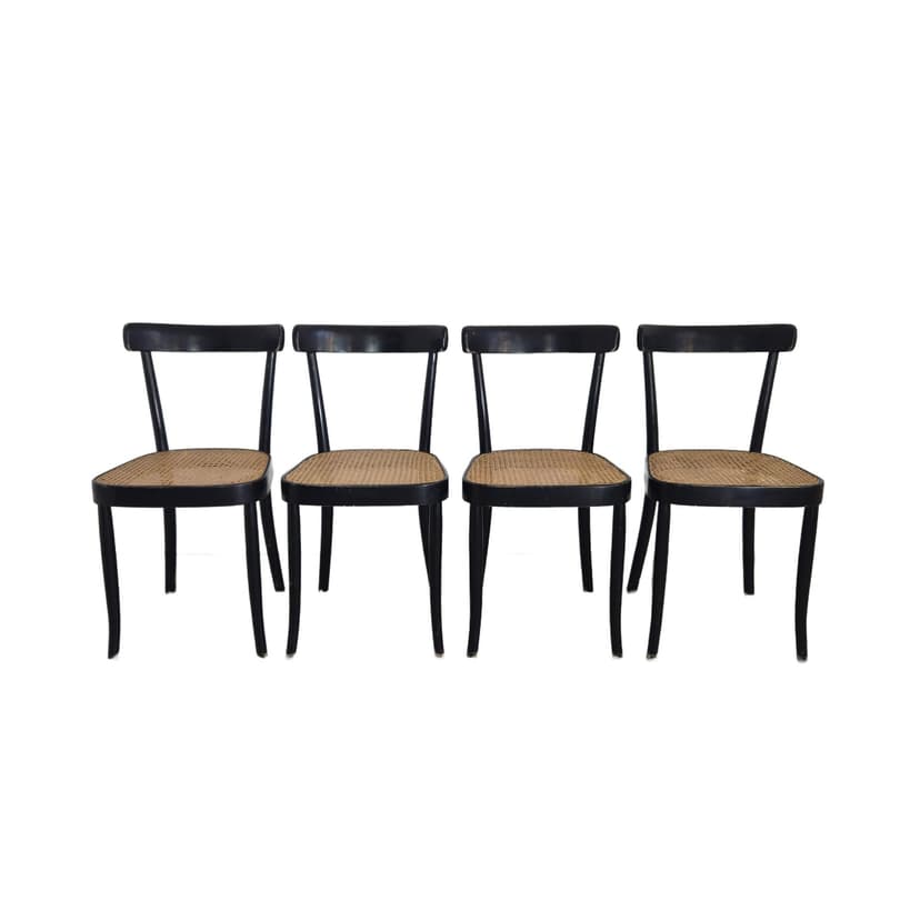 Set of chairs, black wood, brown rattan, by M. Moser, Horgenglarus, Switzerland, 1940s.